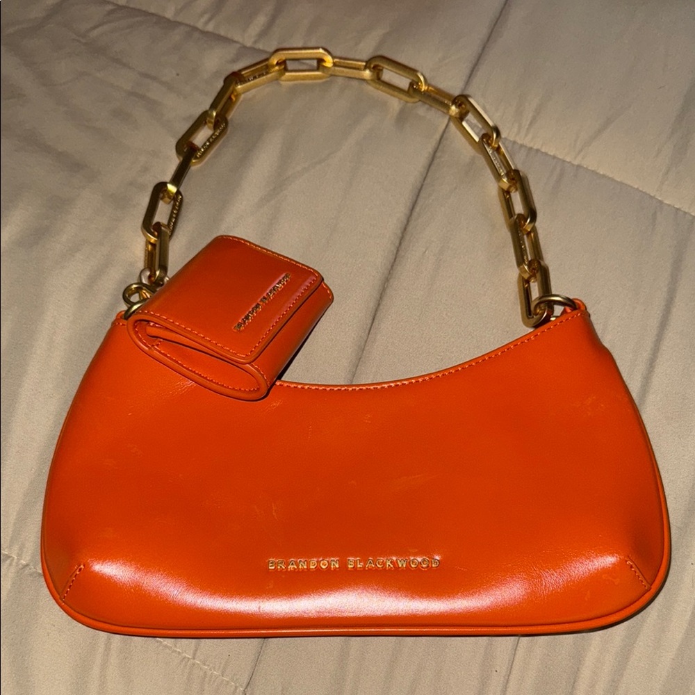 Brandon Blackwood Orange Shoulder Bag with Gold Chain